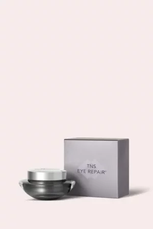 SkinMedica TNS Eye Repair cream jar and box on light background.