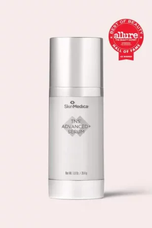 SkinMedica TNS Advanced Serum bottle with award badge on light background.