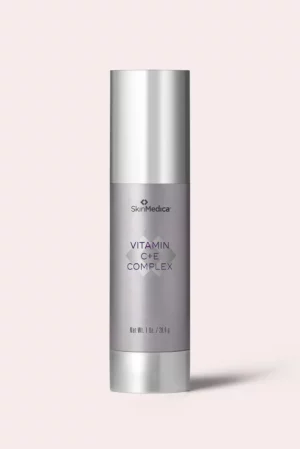 SkinMedica Vitamin C+E Complex serum bottle on pale background.