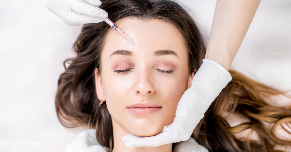 Woman receiving wrinkle treatment injection at a clinic in Grove City, Ohio