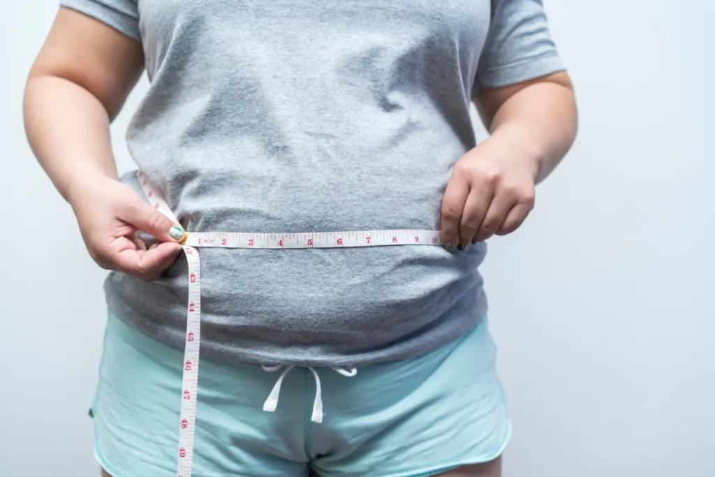 Measuring abdominal fat for medical weight loss treatment at Astria Aesthetics